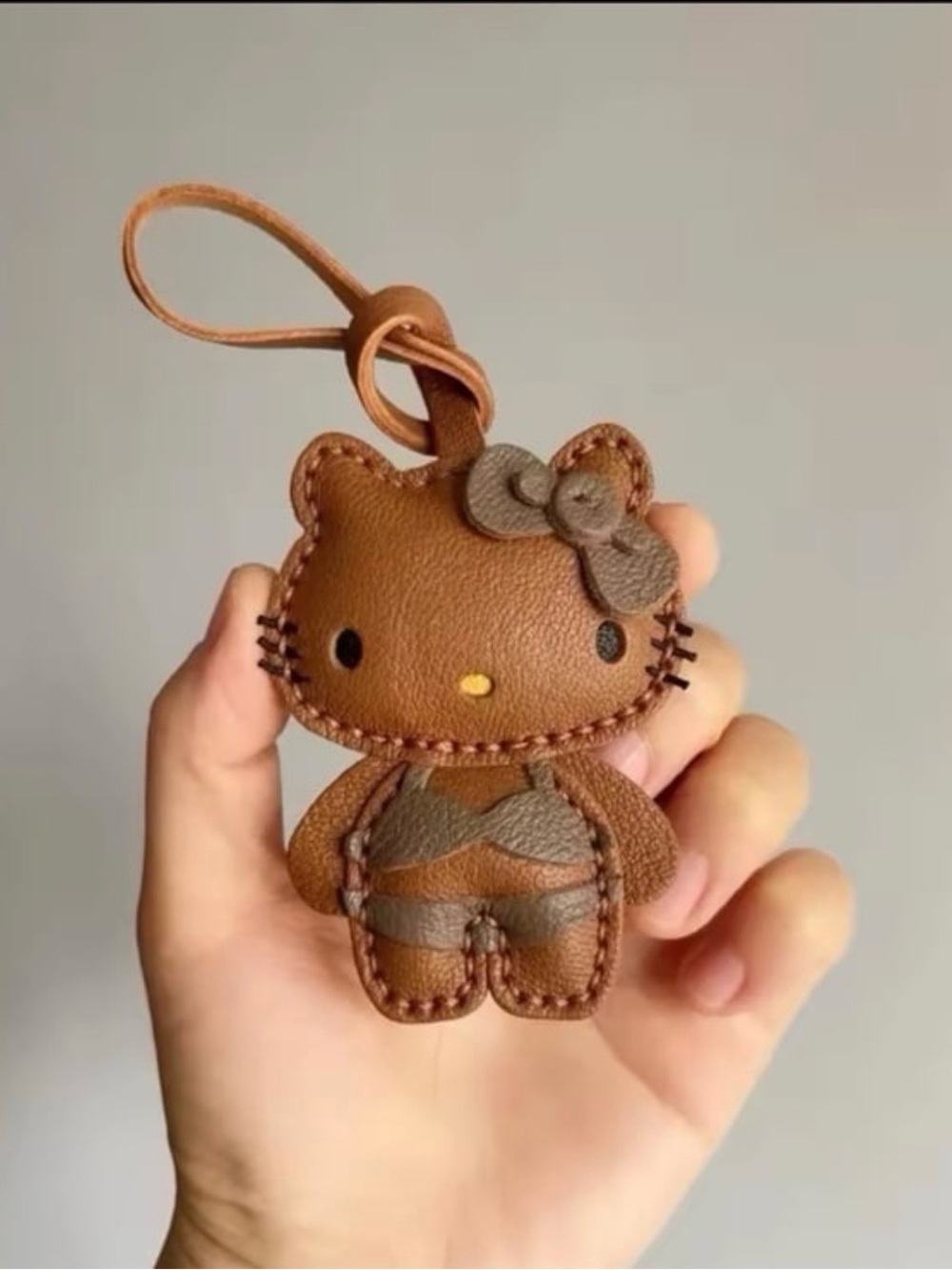 Hello Kitty Brown Leather Bag Charm
-Monochrome Edition Dark Brown Bikini 🆕